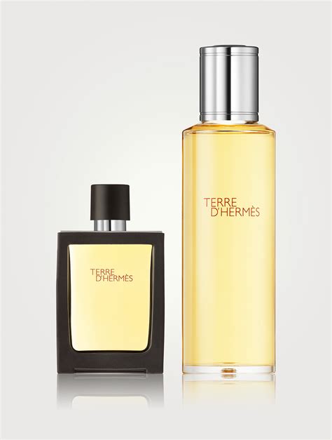 Terre d'Hermes Parfum travel spray and refill .